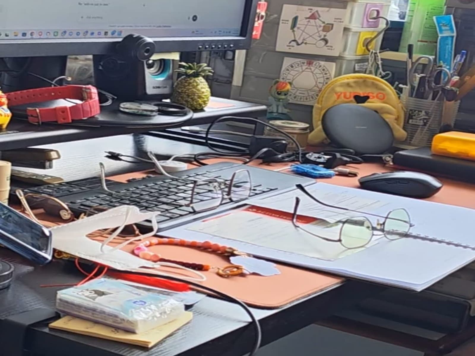 Messy desk with scattered papers